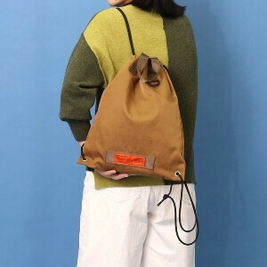 2025新作【COOCO】orange tag 撥水ナップサック A4収納可能