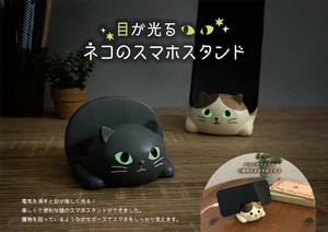 目が光る猫のスマホスタンド　//お土産　アニマル　動物　インテリア　ギフト