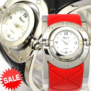 【在庫処分SALE】ローリングフェイスの幅広ハーフバングルウォッチ　レディース　腕時計
