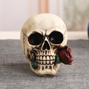 口を噛むバラの花の頭蓋骨の彫像の工芸品0506STL442