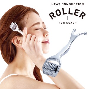 Heat conduction scalp roller scalp massage