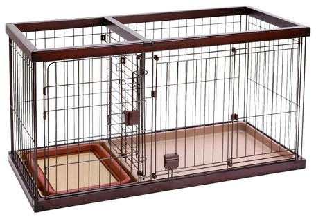 dog crate with toilet area